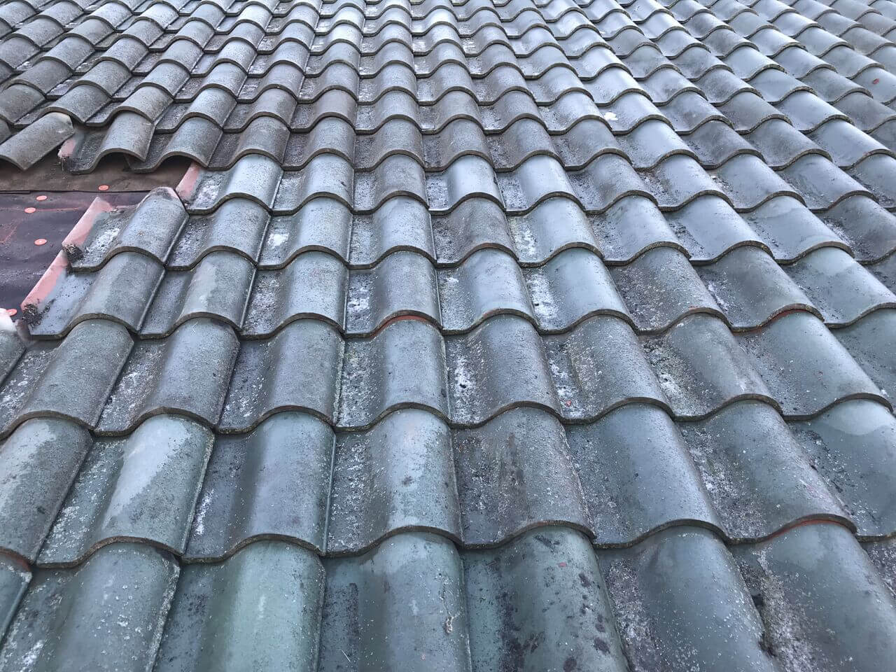 Spanish Tile Roof Repair where new meets original