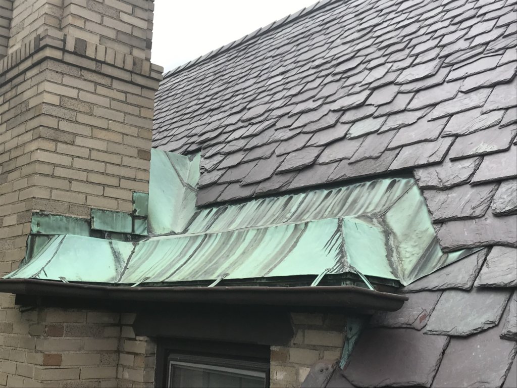 Rockford Slate Roof has Copper Flashing repair