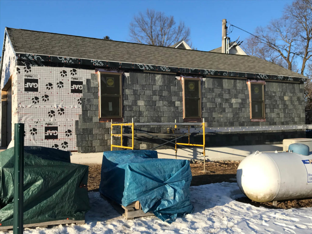 Slate Siding being installed by roofing contractor