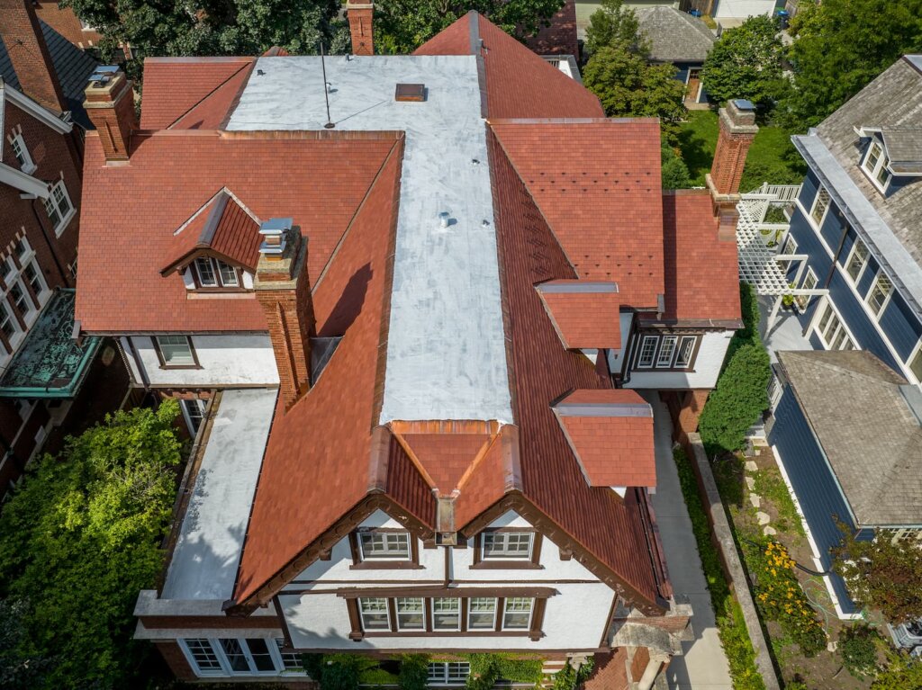 Evanston Ludowici Flat Slab Style Tile Roof with Copper Ridges
