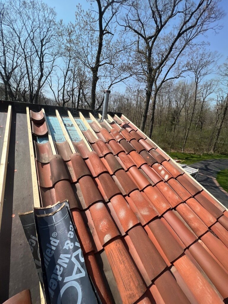 Tile being installed for Roof Repair in Lake Forest
