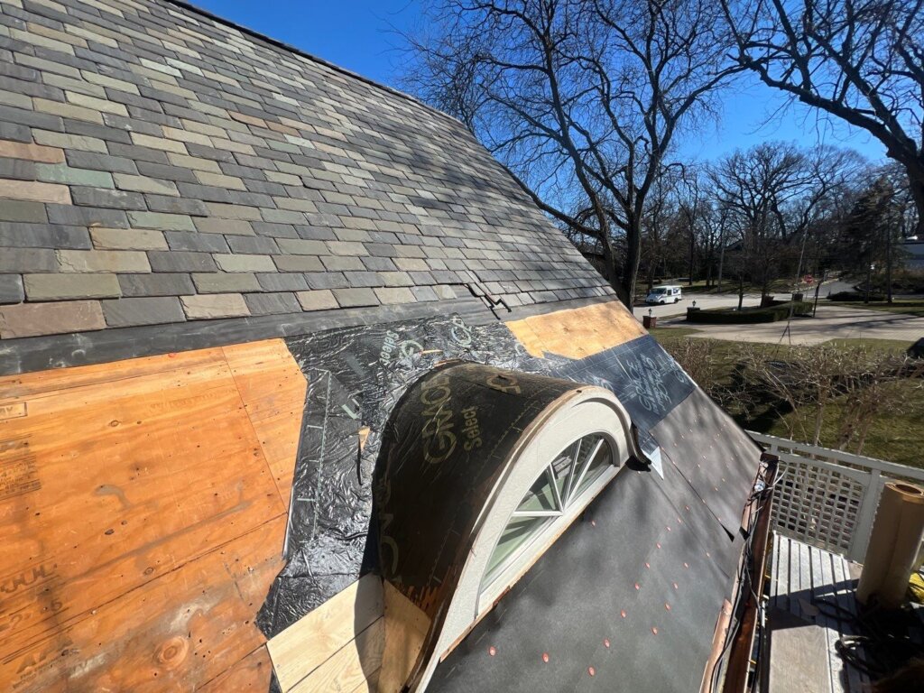 Copper Roof Repair with Slate Removed to lay Tar Paper